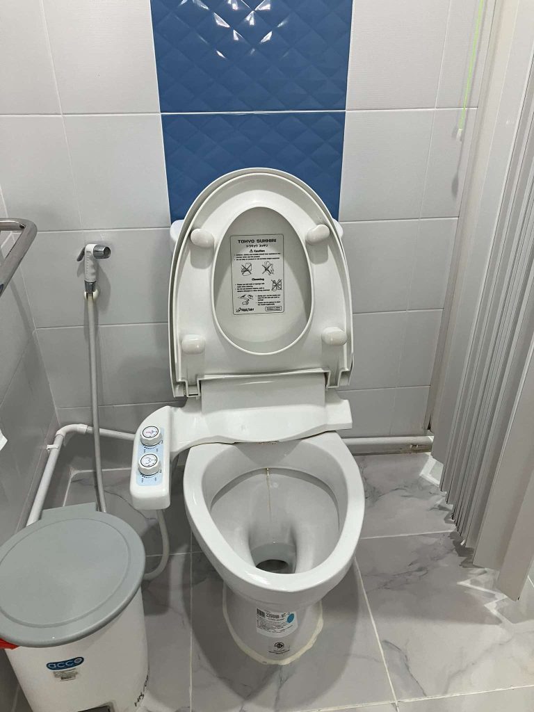 Japanese style toilet with bum gun bidet at McCormick Hospital